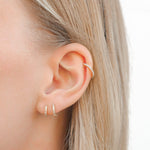 huggie earrings (1878343975010)